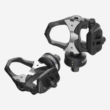 Svarta och silverfärgade pedaler för cykel med klicksystem.